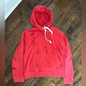 KATIEJNYC red hooded sweatshirt with holes